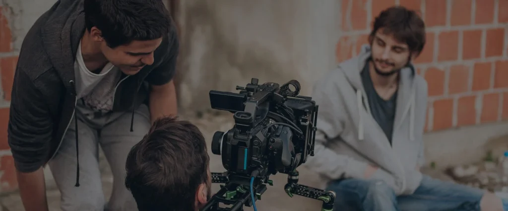 Director working with cast on set